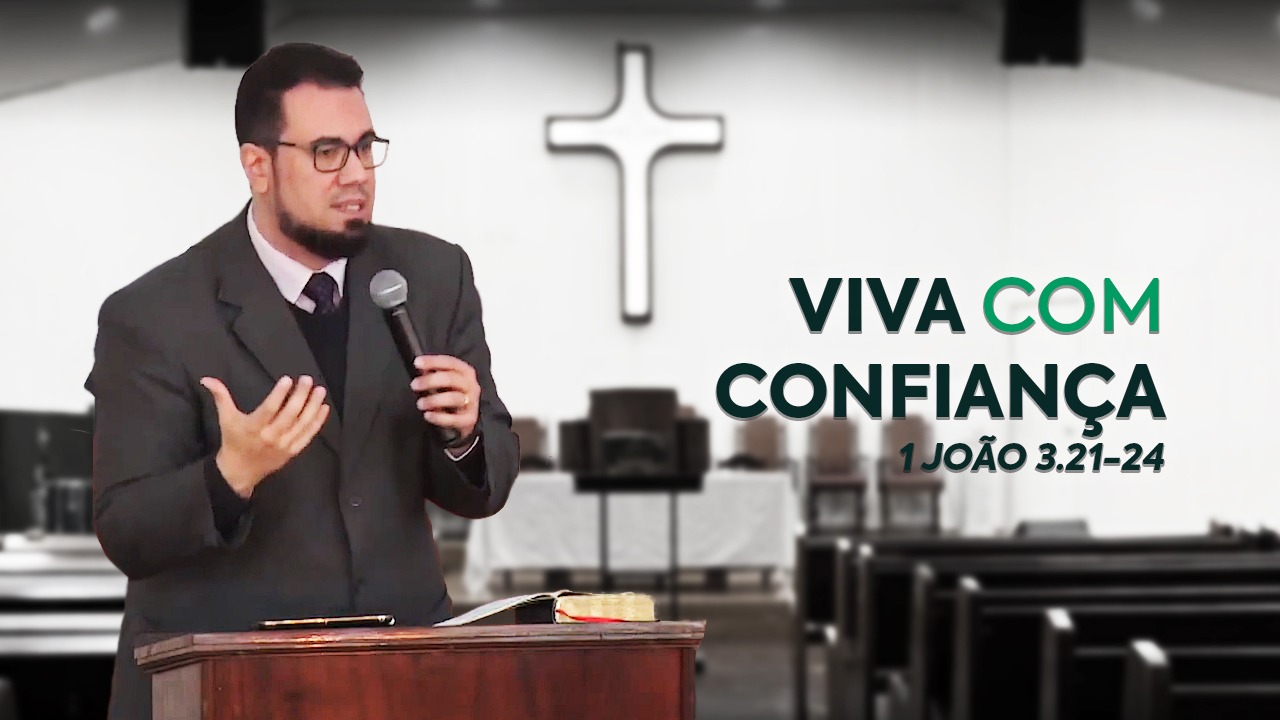 Imagem cujo fundo está desfocado, e é uma foto da parede de trás da nave da igreja, com uma cruz e, mais à frente, bancos aos lados. Em destaque, do lado esquerdo, está o Rev. Thiago Mattos atrás do púlpito. E ao lado direito, o título e a passagem bíblica do sermão em verde: "Viva com confiança - 1 João 3.31-24".